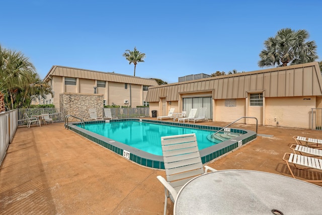 10789 N Military Trl Unit 3, Palm Beach Gardens, FL 33410 - community pool with a patio