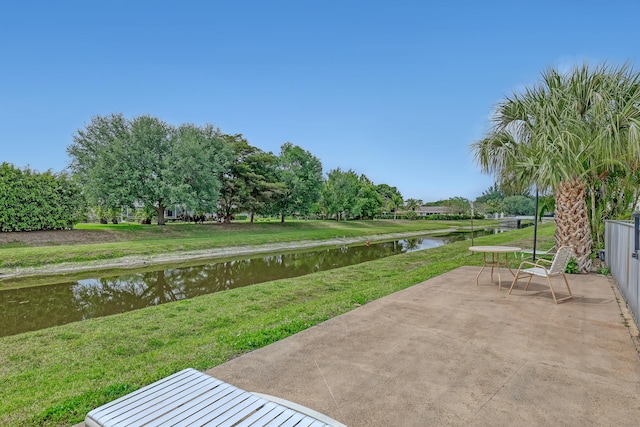 10789 N Military Trl Unit 3, Palm Beach Gardens, FL 33410 - view of patio / terrace featuring a water view