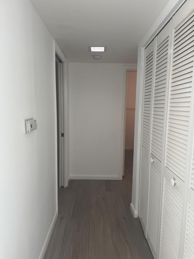 10789 N Military Trl Unit 3, Palm Beach Gardens, FL 33410 - hallway with wood finished floors and baseboards