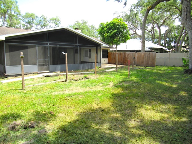 334 Brookedge Ter, Sebastian, FL 32958 - back of house featuring a sunroom