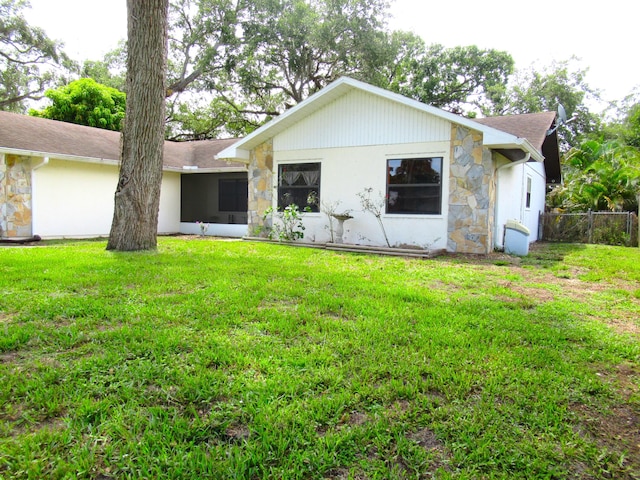 334 Brookedge Ter, Sebastian, FL 32958 - back of house featuring stone siding