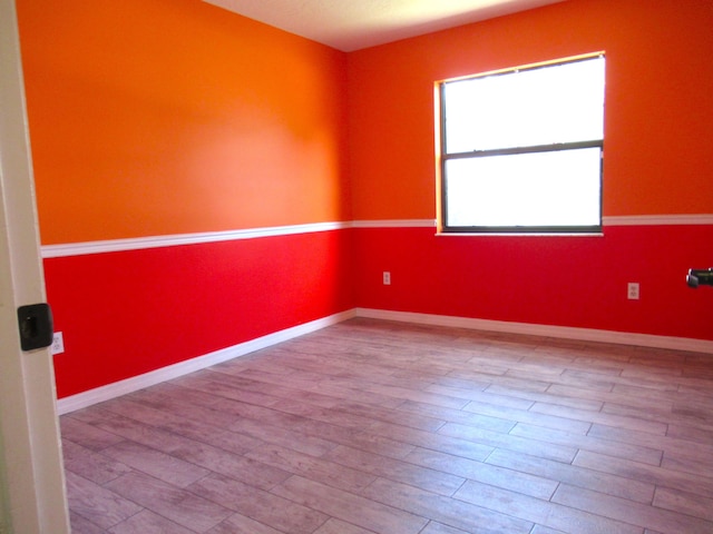 334 Brookedge Ter, Sebastian, FL 32958 - spare room featuring wood finished floors and baseboards
