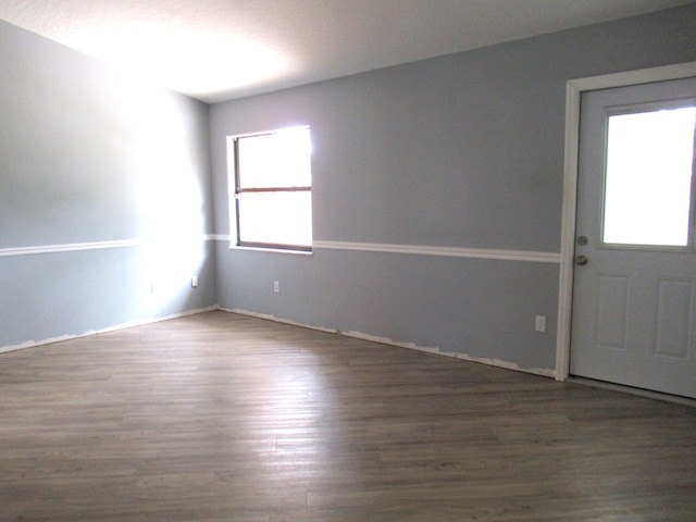 334 Brookedge Ter, Sebastian, FL 32958 - empty room featuring wood finished floors and baseboards