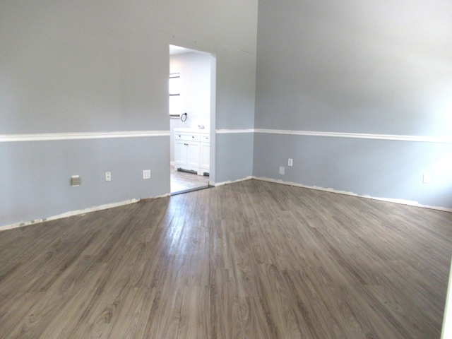 334 Brookedge Ter, Sebastian, FL 32958 - unfurnished room with wood finished floors and baseboards