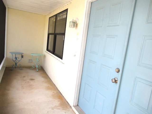 334 Brookedge Ter, Sebastian, FL 32958 - doorway to property with stucco siding