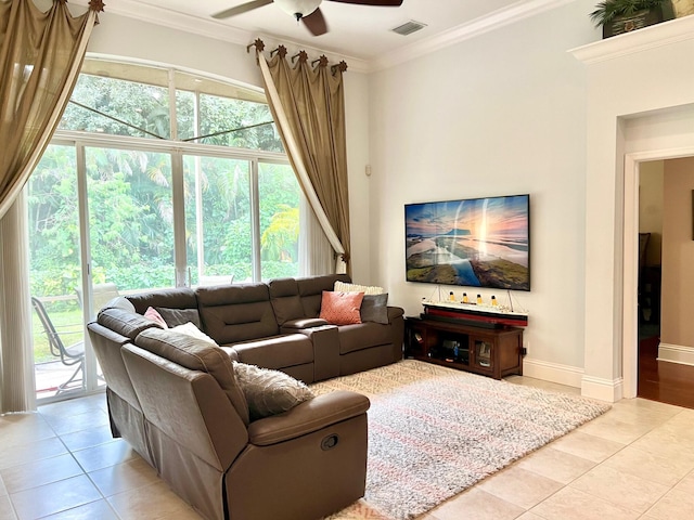 4920 Swans Ln, Coconut Creek, FL 33073 - living area with light tile patterned floors, ceiling fan, crown molding, and plenty of natural light