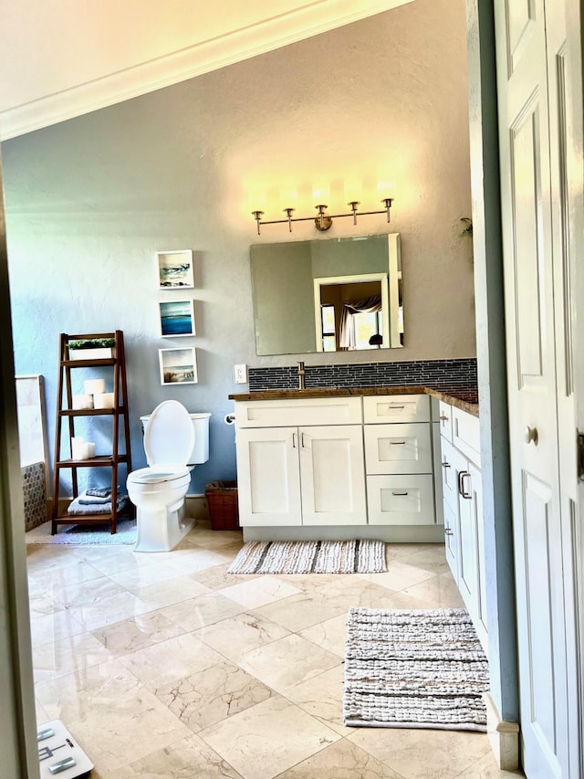 4920 Swans Ln, Coconut Creek, FL 33073 - bathroom featuring crown molding, vanity, and toilet
