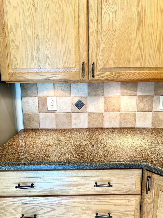 4920 Swans Ln, Coconut Creek, FL 33073 - detailed view of tasteful backsplash and light brown cabinets