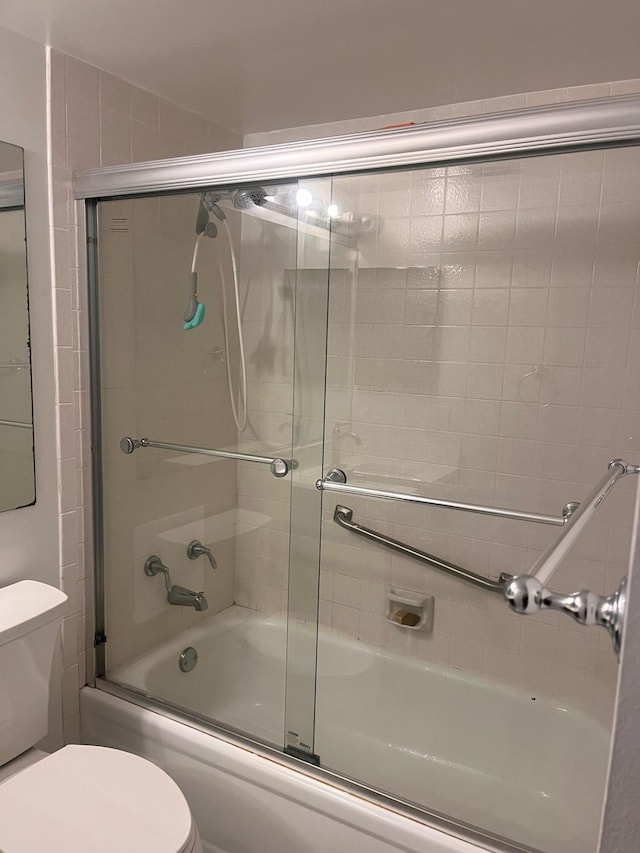 4988 Sable Pine Cir Unit B2, West Palm Beach, FL 33417 - full bathroom featuring toilet and enclosed tub / shower combo