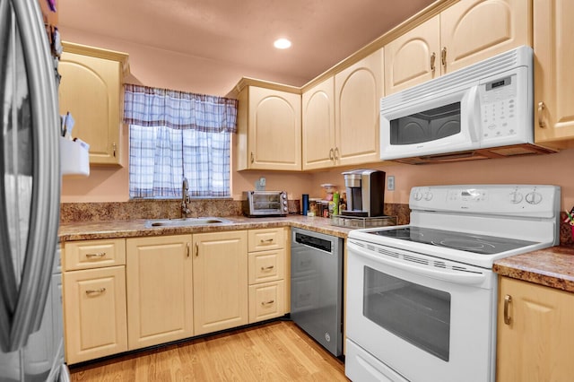 5229 Lakefront Blvd Unit A, Delray Beach, FL 33484 - kitchen featuring stainless steel appliances, light wood-style flooring, and recessed lighting