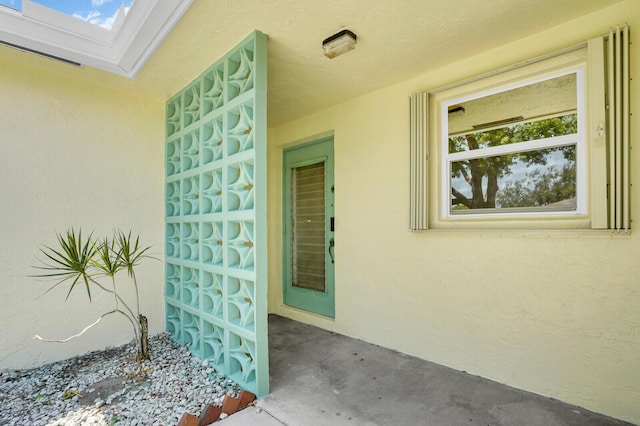 5229 Lakefront Blvd Unit A, Delray Beach, FL 33484 - doorway to property with stucco siding