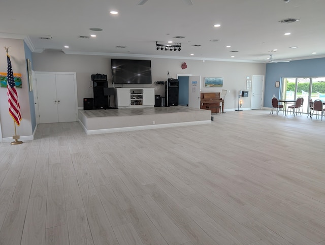 5229 Lakefront Blvd Unit A, Delray Beach, FL 33484 - unfurnished living room with crown molding, recessed lighting, and light wood-style floors