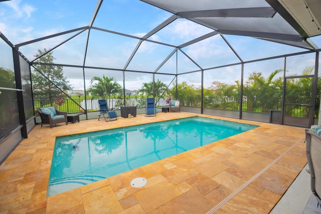 9351 SW Serapis Way, Port Saint Lucie, FL 34987 - view of swimming pool with a patio and a lanai