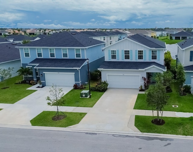 9351 SW Serapis Way, Port Saint Lucie, FL 34987 - traditional-style house with a residential view, a garage, concrete driveway, and a front lawn