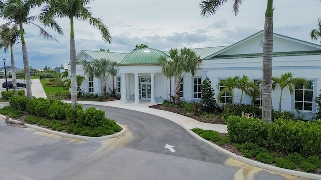 9351 SW Serapis Way, Port Saint Lucie, FL 34987 - view of property featuring curved driveway