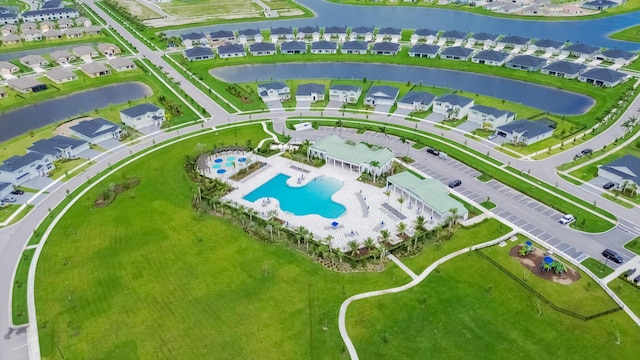 9351 SW Serapis Way, Port Saint Lucie, FL 34987 - aerial view of residential area featuring a pool area and a nearby body of water