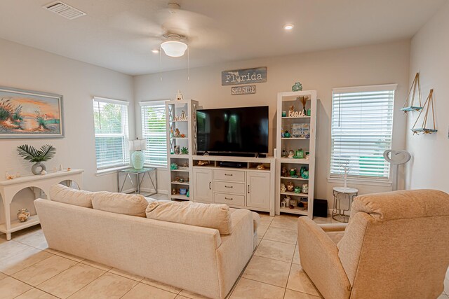 9351 SW Serapis Way, Port Saint Lucie, FL 34987 - living area featuring light tile patterned flooring, a ceiling fan, and recessed lighting