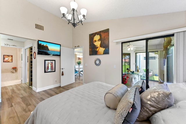 8178 Mooring Cir, Boynton Beach, FL 33472 - bedroom featuring access to outside, a chandelier, wood finished floors, baseboards, and ensuite bathroom