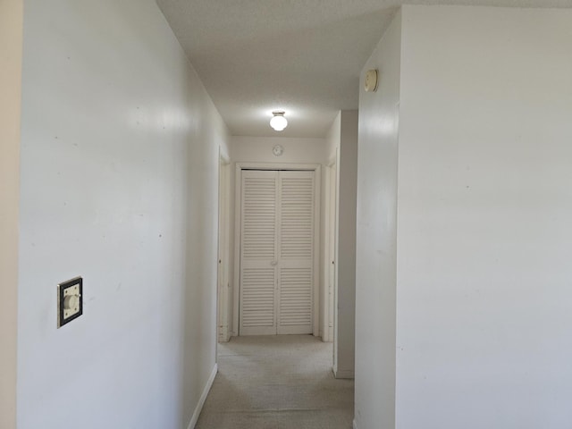 1003 SW 7th Ave, Boynton Beach, FL 33426 - corridor with light colored carpet and baseboards