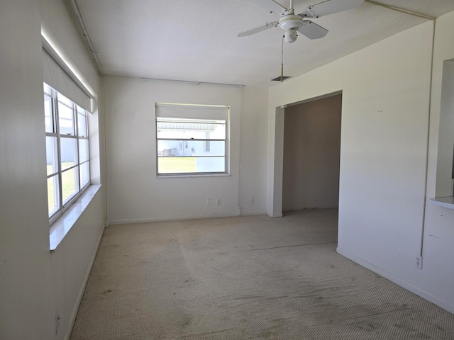 1003 SW 7th Ave, Boynton Beach, FL 33426 - unfurnished room featuring healthy amount of natural light, light colored carpet, and baseboards