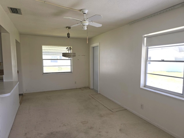 1003 SW 7th Ave, Boynton Beach, FL 33426 - empty room with light colored carpet, a ceiling fan, and baseboards
