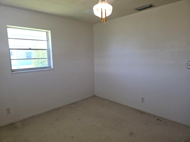 1003 SW 7th Ave, Boynton Beach, FL 33426 - spare room featuring light colored carpet and baseboards