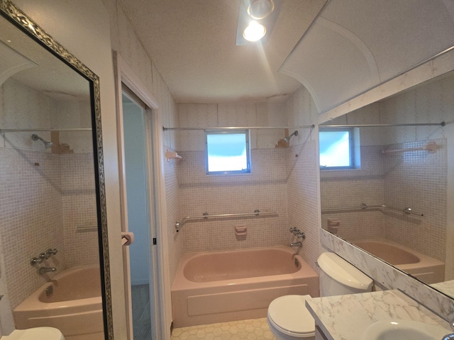 1003 SW 7th Ave, Boynton Beach, FL 33426 - bathroom featuring toilet, shower / tub combination, and healthy amount of natural light