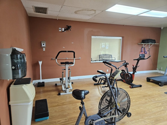 2941 Crrosley Dr W Unit E, West Palm Beach, FL 33415 - exercise area with a drop ceiling, wood finished floors, and baseboards