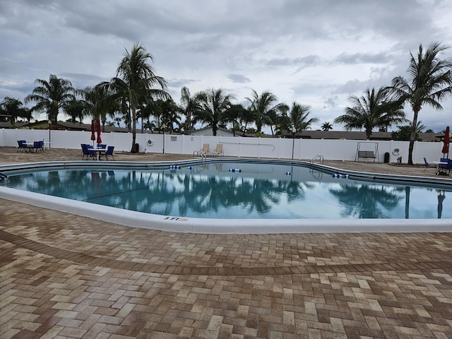 2941 Crrosley Dr W Unit E, West Palm Beach, FL 33415 - community pool featuring a patio