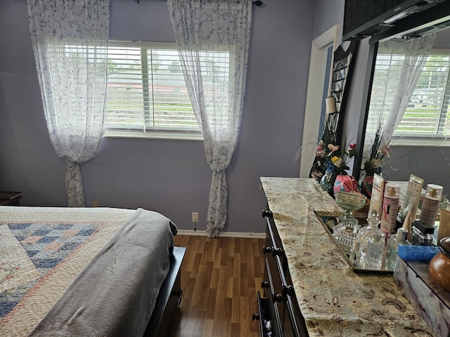 2941 Crrosley Dr W Unit E, West Palm Beach, FL 33415 - bedroom with wood finished floors and baseboards