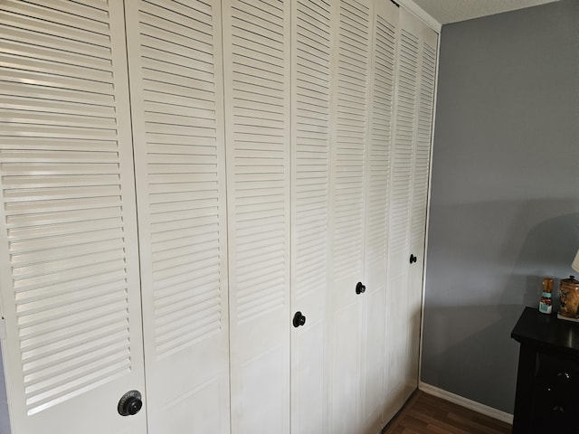 2941 Crrosley Dr W Unit E, West Palm Beach, FL 33415 - detailed view of wood finished floors and baseboards