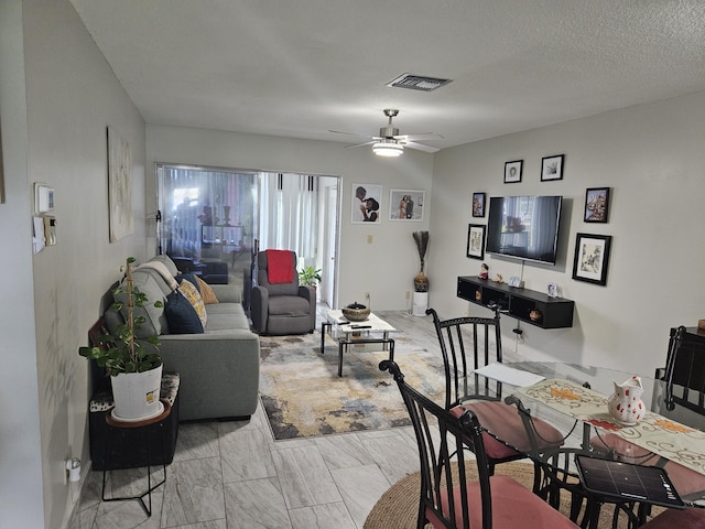 2941 Crrosley Dr W Unit E, West Palm Beach, FL 33415 - living room featuring a ceiling fan