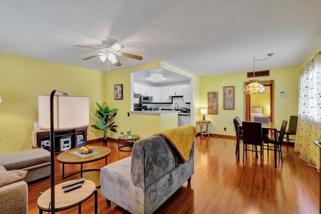 278 Monaco Way Unit F, Delray Beach, FL 33446 - living area with a ceiling fan, wood finished floors, and baseboards