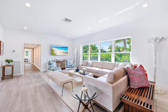 215 Cortez Rd, West Palm Beach, FL 33405 - living area with light wood-style flooring, recessed lighting, and baseboards