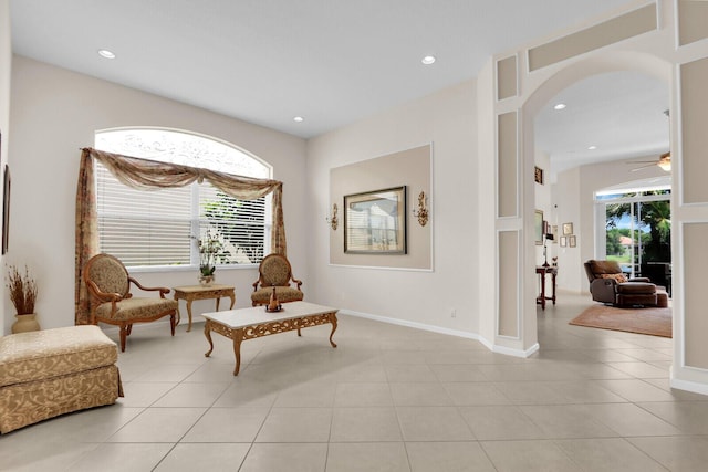 7144 Demedici Cir, Delray Beach, FL 33446 - sitting room featuring arched walkways, a ceiling fan, recessed lighting, and light tile patterned floors