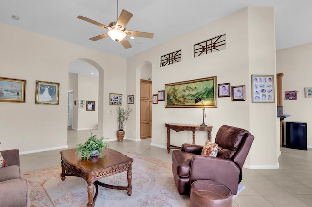 7144 Demedici Cir, Delray Beach, FL 33446 - living room with arched walkways, light tile patterned floors, and ceiling fan