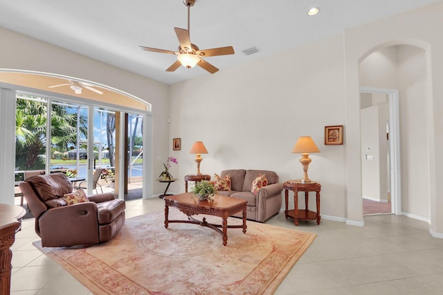 7144 Demedici Cir, Delray Beach, FL 33446 - living room featuring arched walkways, a ceiling fan, light tile patterned flooring, and recessed lighting