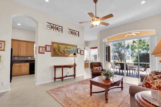 7144 Demedici Cir, Delray Beach, FL 33446 - living area with a ceiling fan, arched walkways, light tile patterned floors, and recessed lighting