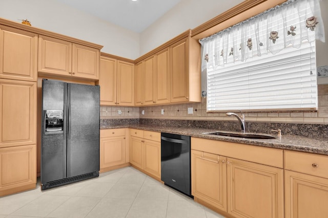 7144 Demedici Cir, Delray Beach, FL 33446 - kitchen with black appliances, tasteful backsplash, dark stone countertops, light tile patterned floors, and light brown cabinetry
