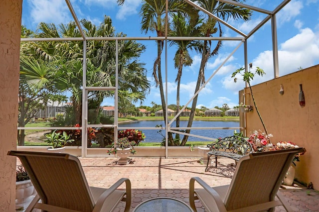 7144 Demedici Cir, Delray Beach, FL 33446 - sunroom / solarium featuring a water view