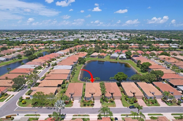 7144 Demedici Cir, Delray Beach, FL 33446 - aerial view of property and surrounding area featuring a large body of water and nearby suburban area