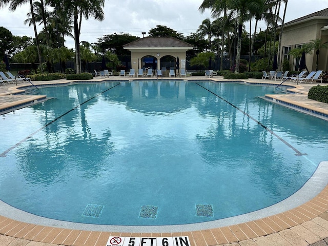 7144 Demedici Cir, Delray Beach, FL 33446 - community pool with a patio