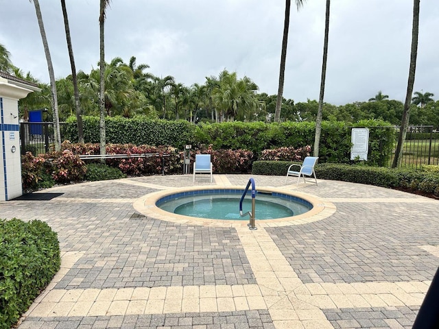 7144 Demedici Cir, Delray Beach, FL 33446 - view of pool featuring a community hot tub and a patio