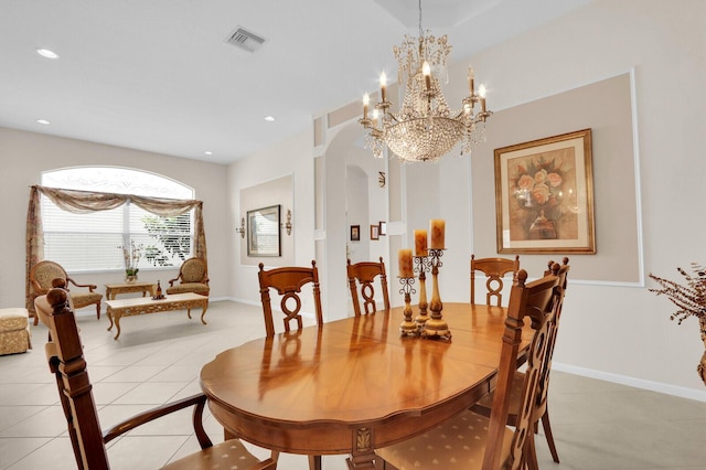 7144 Demedici Cir, Delray Beach, FL 33446 - dining space featuring arched walkways, light tile patterned flooring, a chandelier, and recessed lighting