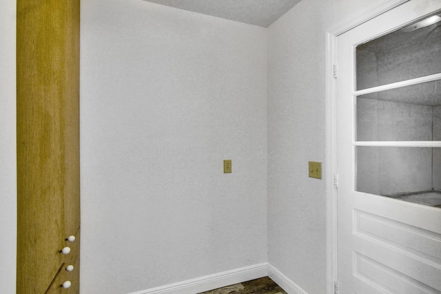 5666 SE Matousek St, Stuart, FL 34997 - laundry area featuring baseboards