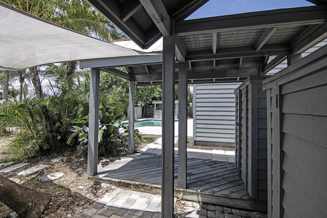 5666 SE Matousek St, Stuart, FL 34997 - view of patio featuring a wooden deck