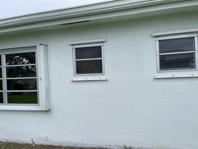 108 SW 18th St, Boynton Beach, FL 33426 - view of side of home with stucco siding