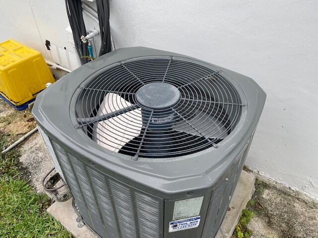 108 SW 18th St, Boynton Beach, FL 33426 - exterior view of cooling unit and stucco siding