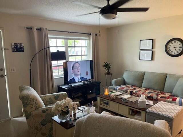 108 SW 18th St, Boynton Beach, FL 33426 - living area featuring ceiling fan