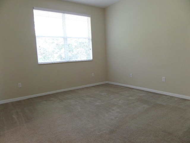 328 Lake Monterey Cir, Boynton Beach, FL 33426 - spare room with carpet flooring and baseboards